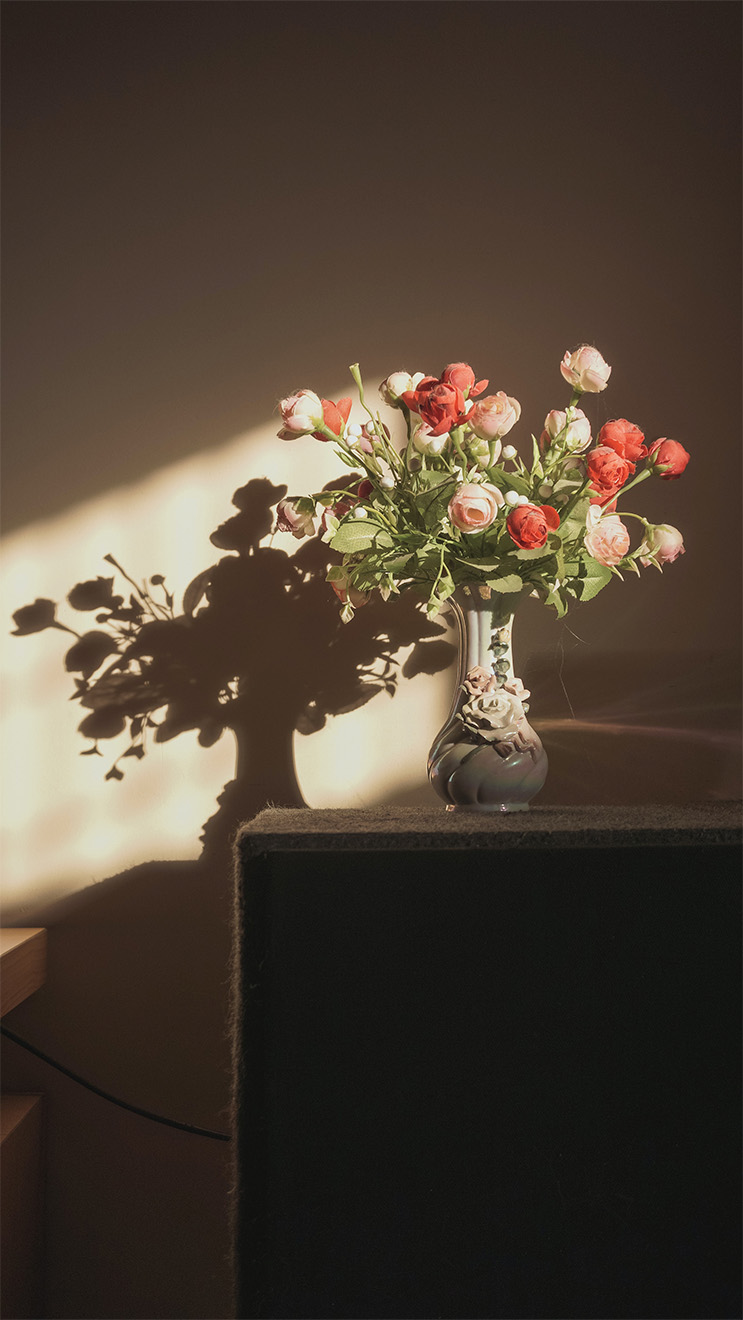 flowers on a bedside table