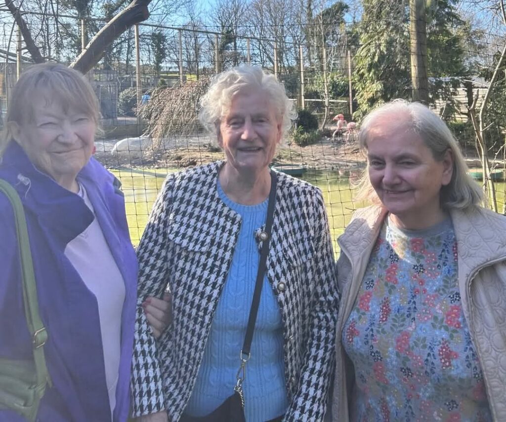 residents smiling at the zoo together